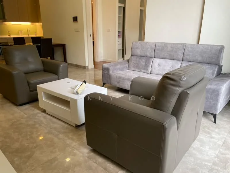 Living features: grey leather 3-seater sofa, grey fabric 2-seater sofa, white coffee table, marble tile flooring, recessed downlights, wall-mounted TV, decorative wall art, open shelving unit in background; style: modern.