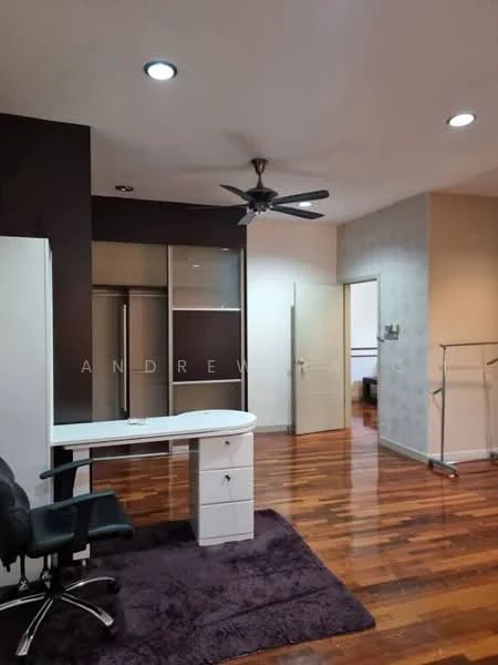 Study features: wooden flooring, dark accent wall, light wallpaper, ceiling fan, desk with drawers, black office chair, built-in wardrobe, area rug, doorway to adjacent room; style: modern.