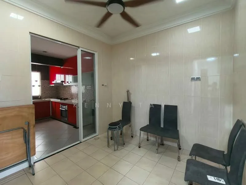 Room features: cream tiled walls, cream tiled flooring, ceiling fan, sliding glass door, two black chairs, wooden table, kitchen visible through doorway, red cabinetry visible in kitchen.