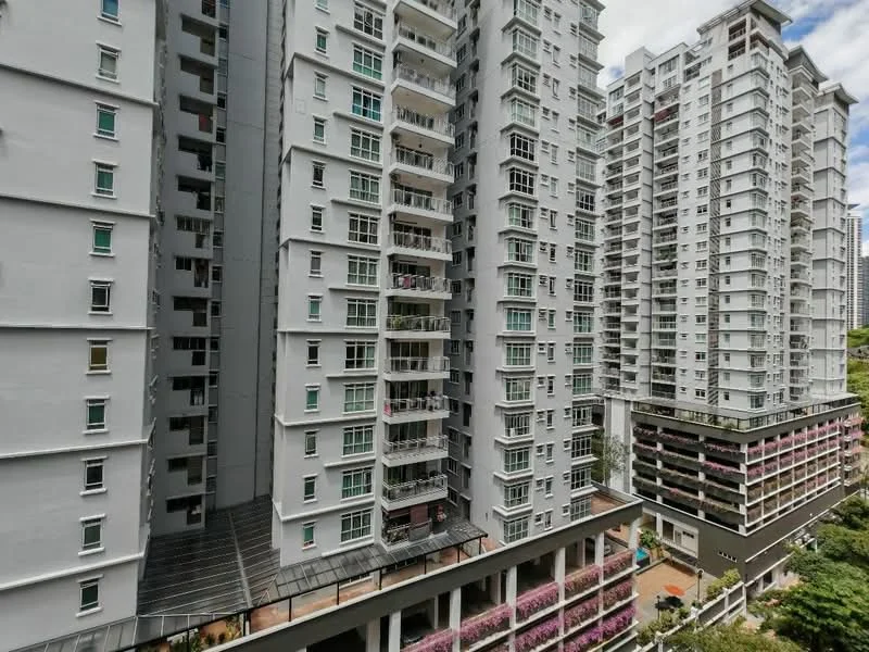 Exterior type: high-rise condominium; features: white painted facade, recessed balconies, multiple storeys, glass windows, landscaped garden area at ground level, surrounded by greenery; style: modern.