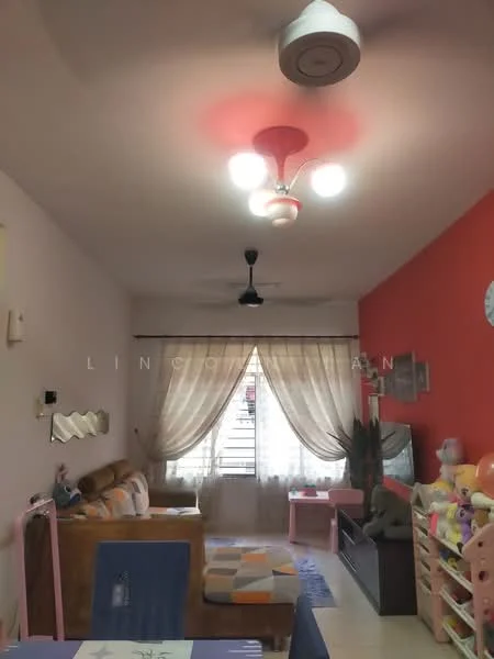 Living features: cream painted walls, red accent wall, 5-blade ceiling fan with light, recessed downlights, floor-to-ceiling window with sheer curtains, sofa in brown leather, coffee table, area rug with geometric pattern, decorative wall clock, children's toys on shelving unit, wooden shelving unit, decorative plants; style: modern.