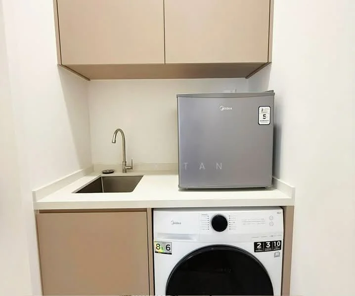 Laundry features: single-bowl stainless-steel sink, chrome pull-down faucet, built-in cabinetry in beige, white countertop, front-load washing machine, mini fridge in silver; style: modern.