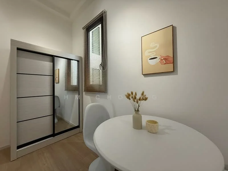 Room features: white painted walls, wooden flooring, round white dining table, white dining chair, sliding wardrobe with mirror, framed artwork on wall, window with blinds, decorative vase with dried flowers; style: modern.