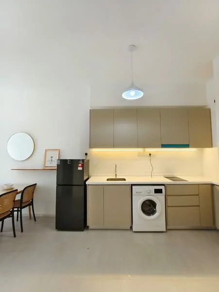 Kitchen features: light grey walls, white ceiling, recessed downlights, single-bowl stainless-steel sink, chrome pull-down faucet, laminate countertop, beige cabinetry, built-in oven, fridge, front-load washing machine, dining table with chairs, pendant light; style: modern.