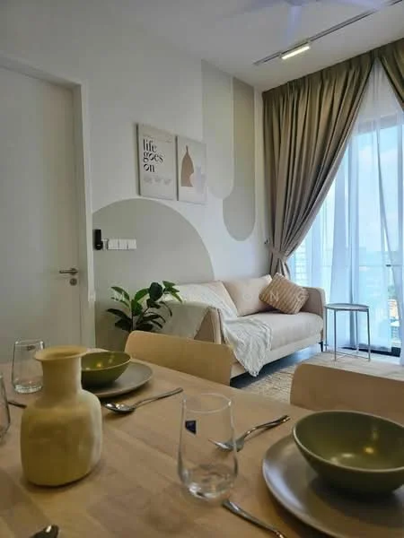 Living features: light wood dining table, 4 dining chairs, green ceramic bowl, glass drinking glasses, decorative beige vase, sofa in light beige, decorative cushions, floor-to-ceiling windows, curtains in light taupe, wall art with abstract design, indoor plant, area rug, neutral wall color with abstract shapes; style: modern; view: city.
