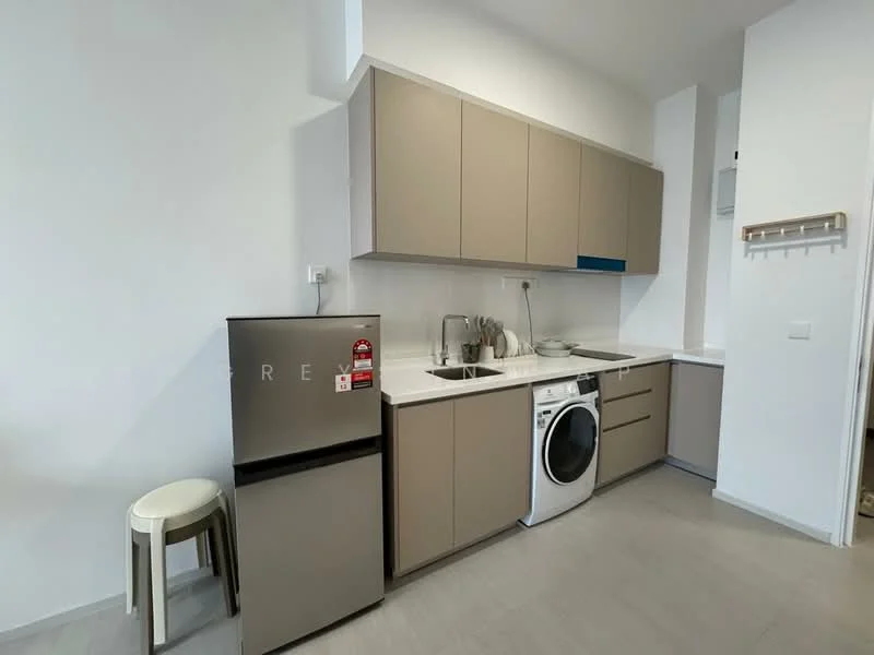 Kitchen features: light brown cabinetry, white countertop, single-bowl stainless-steel sink, chrome pull-down faucet, built-in washing machine, freestanding fridge, ceramic tile flooring, wall-mounted shelf, stool, white walls; style: modern.