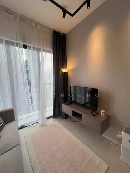 Living features: light grey painted walls, floor-to-ceiling windows with sheer curtains, dark grey curtains, light-colored flooring, wall-mounted TV, wooden TV console, area rug, wall-mounted light fixture, sofa, decorative items on console; style: modern; view: city.