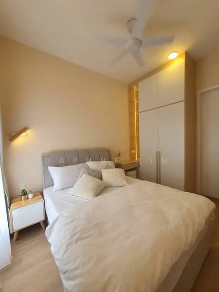Bedroom features: king-size bed with upholstered headboard, white bedding with decorative pillows, wooden bedside table, table lamp on bedside table, built-in wardrobe with sliding doors, wall-mounted light fixture, ceiling fan, light wood flooring, neutral painted walls, window with sheer curtains; style: modern.