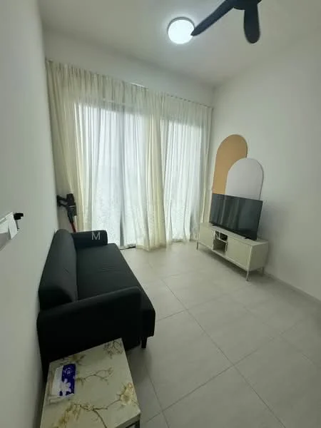 Living features: black fabric sofa, white walls, light grey tiled flooring, floor-to-ceiling windows with sheer curtains, ceiling fan, TV console in white, wall-mounted TV, decorative wall with curved accent, small side table with floral design; style: modern.