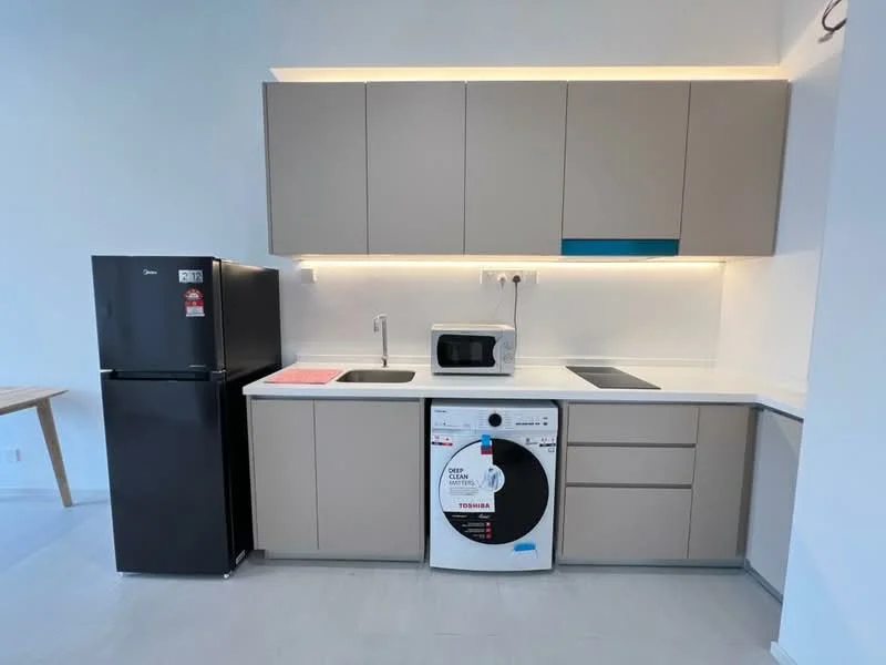Kitchen features: grey cabinetry, white countertop, single-bowl stainless-steel sink, chrome pull-down faucet, built-in microwave, freestanding black fridge, front-load washing machine, recessed LED downlights; style: modern.