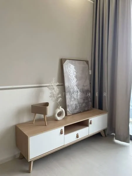 Room features: light grey painted walls, light wood console table, white cabinet doors, decorative artwork on the wall, tall beige curtains, laminate flooring, small decorative vase, minimalist design; style: modern.