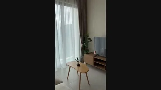 Living features: floor-to-ceiling windows, sheer curtains, light-coloured walls, tile flooring, wooden coffee table, TV console, wall-mounted TV, indoor plant, decorative items on console; style: modern; view: garden.