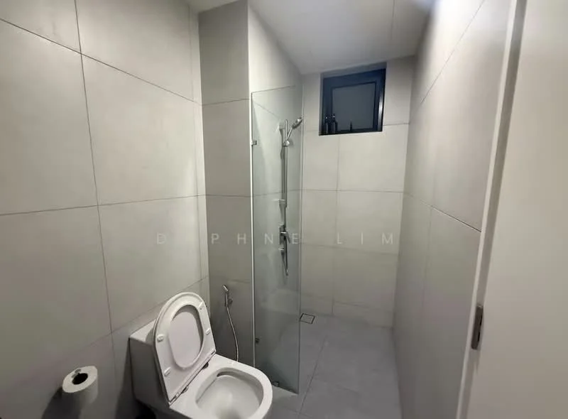 Bathroom features: grey tiled walls, light grey tiled flooring, walk-in shower with glass enclosure, rain shower head, handheld shower, one-piece toilet, small window for natural light, chrome basin mixer, shower drainage, toilet paper holder; style: modern.