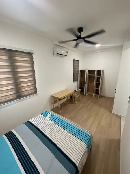 Bedroom features: single bed with striped bedding, wooden flooring, white painted walls, 5-blade ceiling fan, wall-mounted split AC, window with blinds, study table with chair, open wardrobe, natural light from window; style: modern.