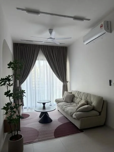 Living features: 3-seater fabric sofa in light beige, round coffee table with black base, area rug with circular pattern in red and cream, floor-to-ceiling windows, sheer curtains, grey drapes, 1 wall-mounted split AC, 5-blade ceiling fan with light, decorative plant in pot, light-coloured walls, recessed ceiling lights; style: modern; view: city.