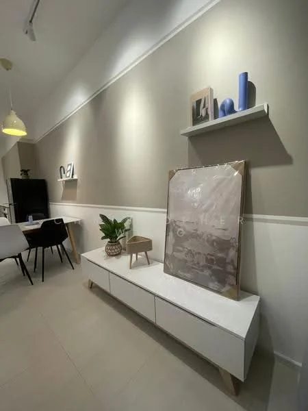 Living features: white painted walls, light grey accent wall, tile flooring, ceiling with recessed lighting, shelf with decorative items, framed artwork, indoor plant, white sideboard with wooden legs, dining table with chairs in background, pendant light fixture; style: modern.