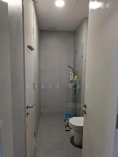 Bathroom features: grey tiled walls, grey tiled flooring, walk-in shower with glass enclosure, rain shower head, handheld shower, one-piece toilet, framed mirror, recessed ceiling lights, shower caddy, toiletries on shelf; style: modern.