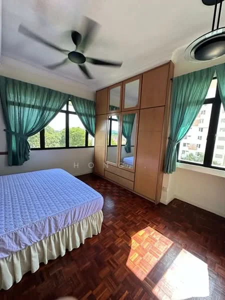 Bedroom features: queen-size bed with light blue bedding, wooden parquet flooring, built-in wardrobe with mirrored doors, floor-to-ceiling windows, green sheer curtains, ceiling fan, decorative light fixture, white painted walls; view: garden.