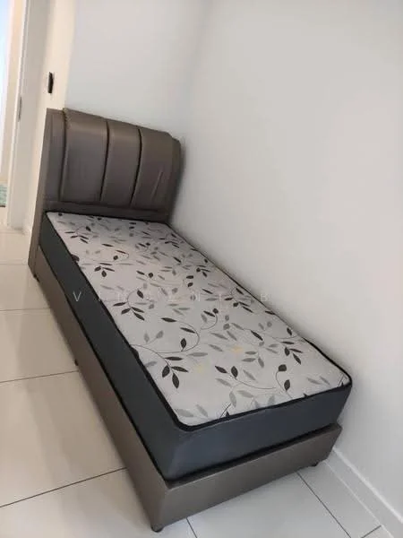 Bedroom features: single bed, upholstered headboard in grey, mattress with floral pattern, white painted walls, tile flooring; style: modern.