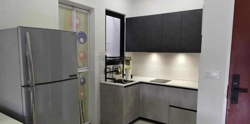 Kitchen features: stainless-steel fridge, grey cabinetry, white countertop, black cooktop, sink with faucet, wall-mounted cabinets, under-cabinet lighting, decorative glass panel with floral pattern; style: modern.