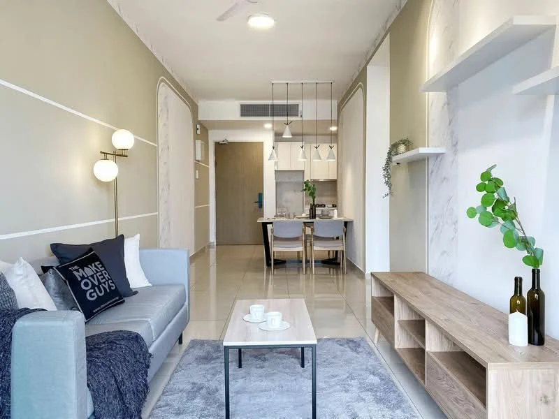 Living features: grey fabric sofa, black throw pillow with text, light wood TV console, decorative vases, area rug with geometric pattern, marble accent wall, recessed ceiling lights, pendant lighting over dining area, dining table with four chairs, open kitchen layout, glossy tiled flooring, greenery in ceramic pot; style: modern.