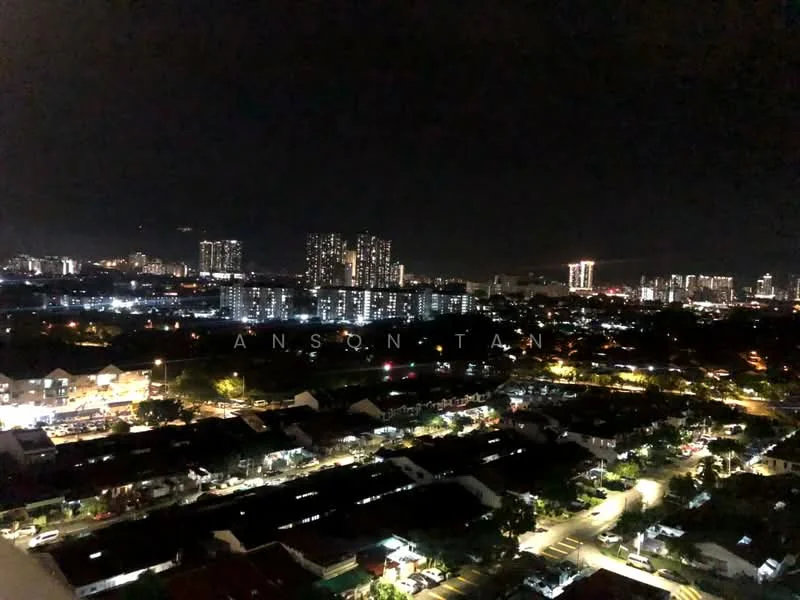 Exterior type: high-rise condominium; features: city skyline view, night lighting, surrounded by residential buildings, urban landscape, visible roadways, parking areas, green spaces; style: modern.