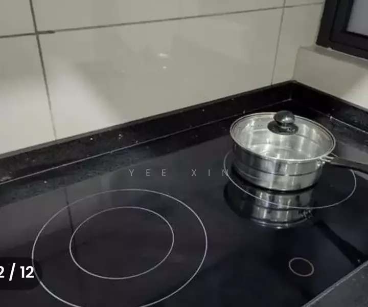 Kitchen features: black granite countertop, induction cooktop, stainless-steel saucepan, grey tiled backsplash, built-in oven, wall-mounted cabinet, under-cabinet lighting; style: modern.