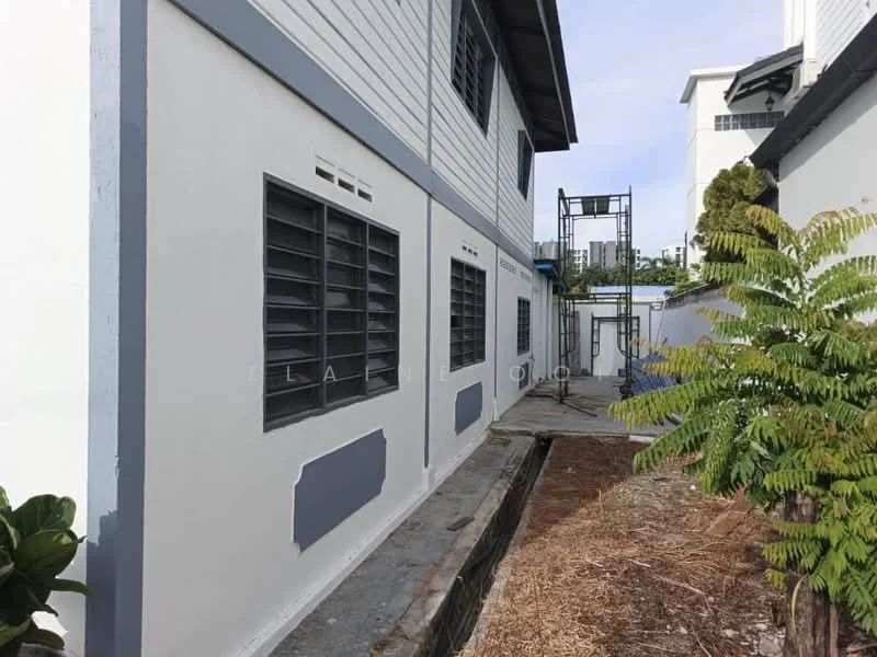 Exterior features: white painted facade, grey accent wall, sliding windows, concrete pathway, landscaped area with plants, gravel ground cover; style: modern.