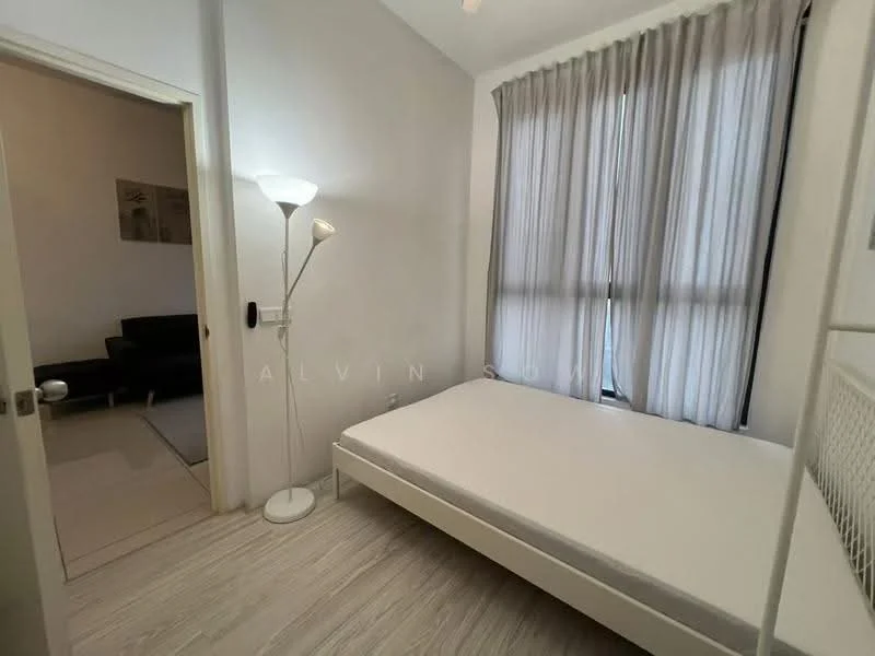 Bedroom features: white painted walls, light wood flooring, large window with sheer curtains, floor lamp, unmade bed frame, minimalist decor, built-in wardrobe, neutral color palette; style: modern. Room features: grey sofa, area rug, open doorway, natural light.