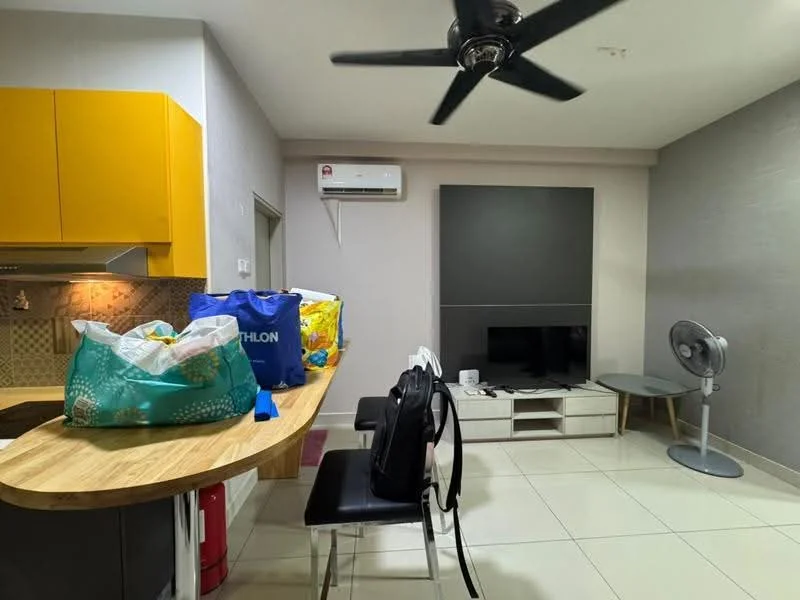 Living features: yellow cabinetry, wooden countertop, black dining chairs, wall-mounted TV, white TV console, ceiling fan, air conditioning unit, tiled flooring, grey accent wall, decorative wall panel, various bags and items on countertop; style: modern.