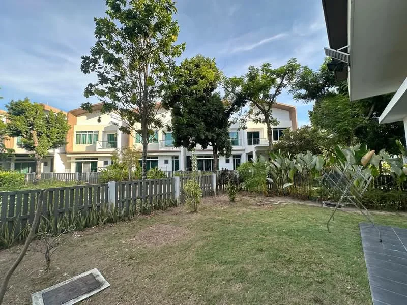Exterior type: linked terrace house; features: manicured lawn, mature trees, landscaped garden, fenced yard, two-storey building, multiple windows, balconies on upper floors, patio area, surrounded by greenery; style: modern.