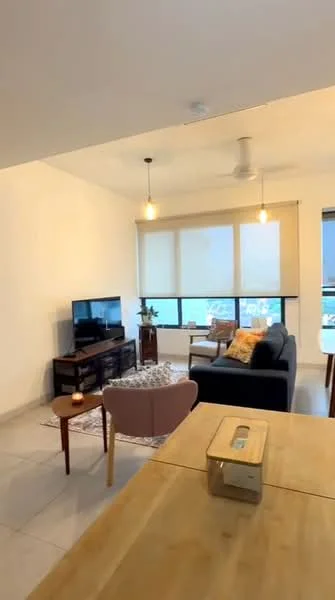 Living features: grey fabric sofa, 3-seater sofa, wooden coffee table, TV console, wall-mounted TV, area rug, 2 pendant lights, ceiling fan, large windows with blinds, decorative cushions, wooden side table, potted plant; style: modern; view: city.