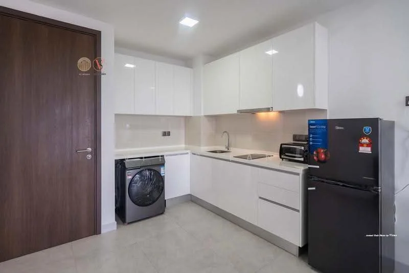 Kitchen features: white flat-panel cabinets, stainless-steel sink, chrome pull-down faucet, white quartz countertop, built-in oven, stainless-steel microwave, black washing machine, black refrigerator, ceramic tile flooring, recessed LED downlights, white tiled backsplash; style: modern.