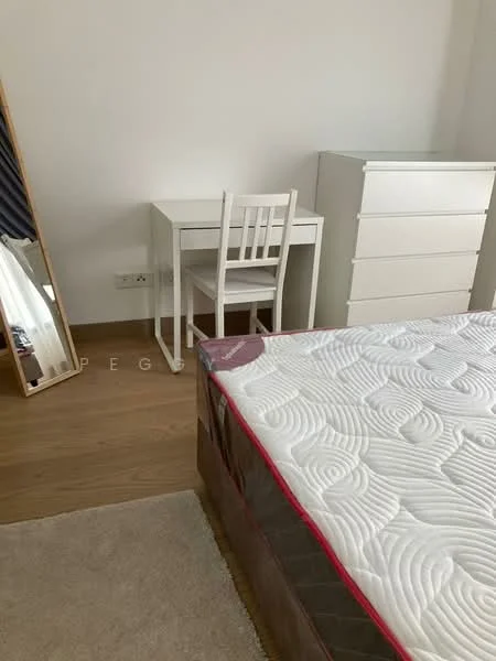 Bedroom features: queen-size bed with mattress, white wooden desk, white wooden chair, 5-drawer white chest of drawers, full-length mirror, light wood flooring, beige area rug, curtains, wall with white paint; style: modern.