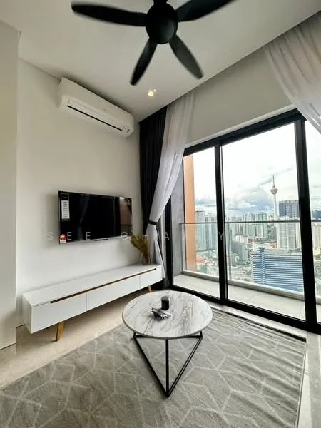 Living features: floor-to-ceiling windows, city skyline view, 3-blade ceiling fan, wall-mounted TV, white TV console, marble coffee table, area rug with geometric pattern, light-colored walls, air conditioning unit; style: modern; view: city.