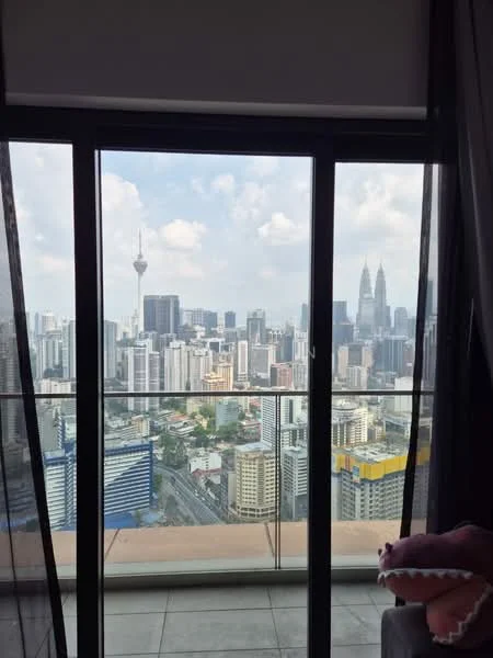 Room features: floor-to-ceiling windows, glass sliding door, city skyline view, balcony, grey tiled flooring; style: modern; view: city.