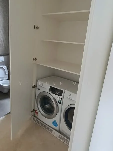 Laundry features: front-load washing machine, front-load dryer, built-in cabinetry, shelves above appliances, neutral wall colour, tile flooring, ventilation grille at base; style: modern.