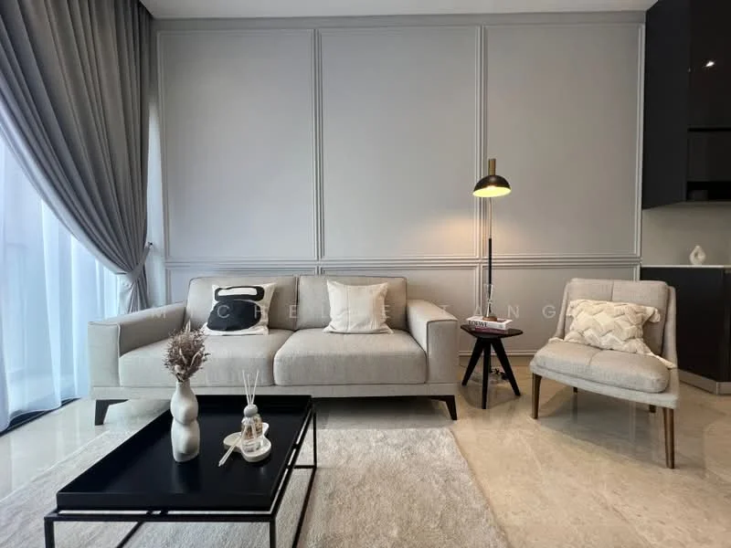 Living features: light grey upholstered 3-seater sofa, beige accent chair, black coffee table, cream area rug, floor-to-ceiling windows with sheer curtains, recessed lighting, decorative wall paneling, table lamp with black shade, decorative vase on coffee table, wall-mounted TV console, neutral wall color; style: modern.