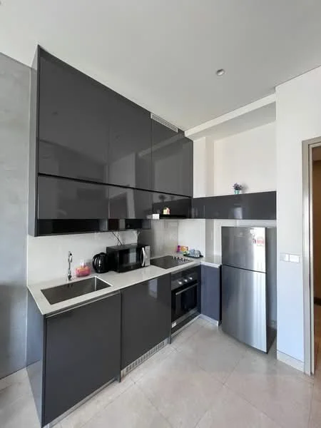 Kitchen features: dark grey high-gloss cabinetry, white quartz countertop, single-bowl stainless-steel sink, chrome pull-down faucet, built-in oven, stainless-steel fridge, black microwave, ceramic tile flooring, recessed downlights, wall-mounted cabinets, integrated cooktop, kitchen island with seating; style: modern.