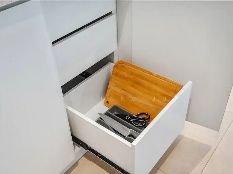 Kitchen features: white cabinetry, drawer with wooden cutting board, drawer with kitchen scissors, drawer with knife, smooth drawer slides, minimalist design, ceramic tile flooring, neutral color palette; style: modern.