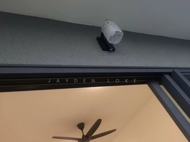 Room features: ceiling fan, wall-mounted light fixture, grey textured wall, sliding glass door.