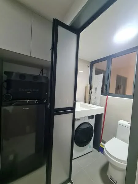 Laundry features: grey tiled flooring, white walls, built-in cabinetry, fridge, front-load washing machine, white toilet, sink with countertop, window for natural light, light fixture; style: modern.