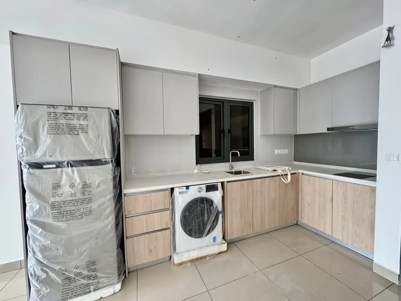 Kitchen features: grey cabinetry, wooden lower cabinets, white countertop, stainless-steel sink, chrome pull-down faucet, built-in oven, ceramic tile flooring, window above sink, refrigerator wrapped in protective film, front-load washing machine wrapped in protective film; style: modern.