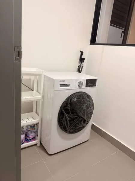 Laundry features: front-load washing machine in white, white shelving unit, grey tiled flooring, white painted walls, window for natural light, plumbing connection visible.