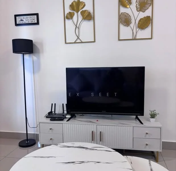 Living features: flat-screen TV on console, white console with textured front, black floor lamp, decorative wall art with gold leaves, round coffee table with marble top, grey tiled flooring, router on console, small potted plant on console; style: modern.