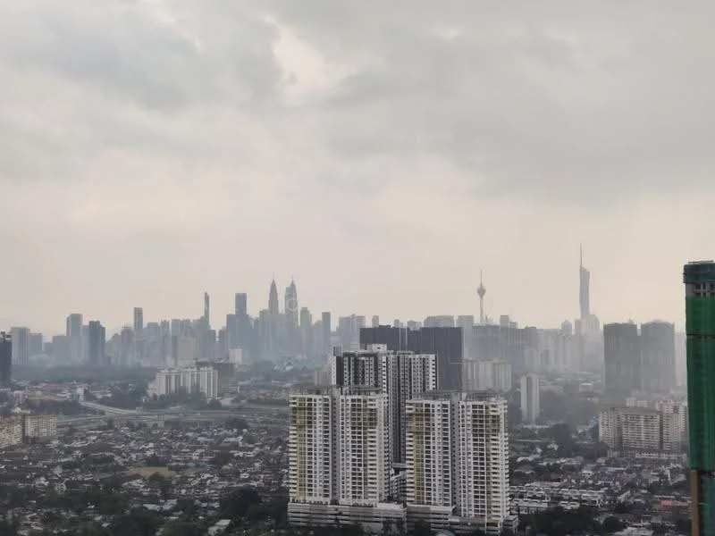 Exterior type: high-rise condominium; features: city skyline view, multiple high-rise buildings, urban landscape, cloudy sky, distant landmarks, varied building heights; style: modern.