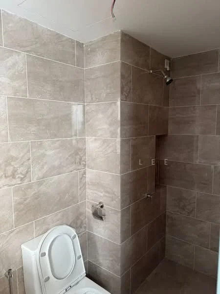 Bathroom features: grey ceramic tile walls, grey ceramic tile flooring, one-piece toilet, shower with wall-mounted shower head, niche for toiletries, chrome faucet, exposed plumbing, recessed ceiling light; style: modern.