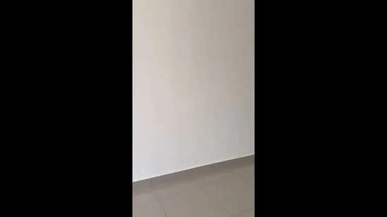 Room features: white painted walls, grey tile flooring.