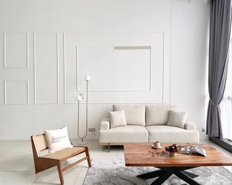 Living features: white painted walls, light grey area rug, cream fabric sofa, wooden coffee table with dark finish, modern floor lamp with white globe shade, wooden accent chair with woven seat, decorative items on coffee table, curtains in light grey, large windows with natural light; style: modern.