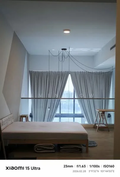 Bedroom features: white painted walls, light wood flooring, large floor-to-ceiling windows, sheer curtains, minimalist pendant light, wooden bed frame without mattress, wooden stool, decorative wall with geometric design, open space layout; style: modern; view: city.